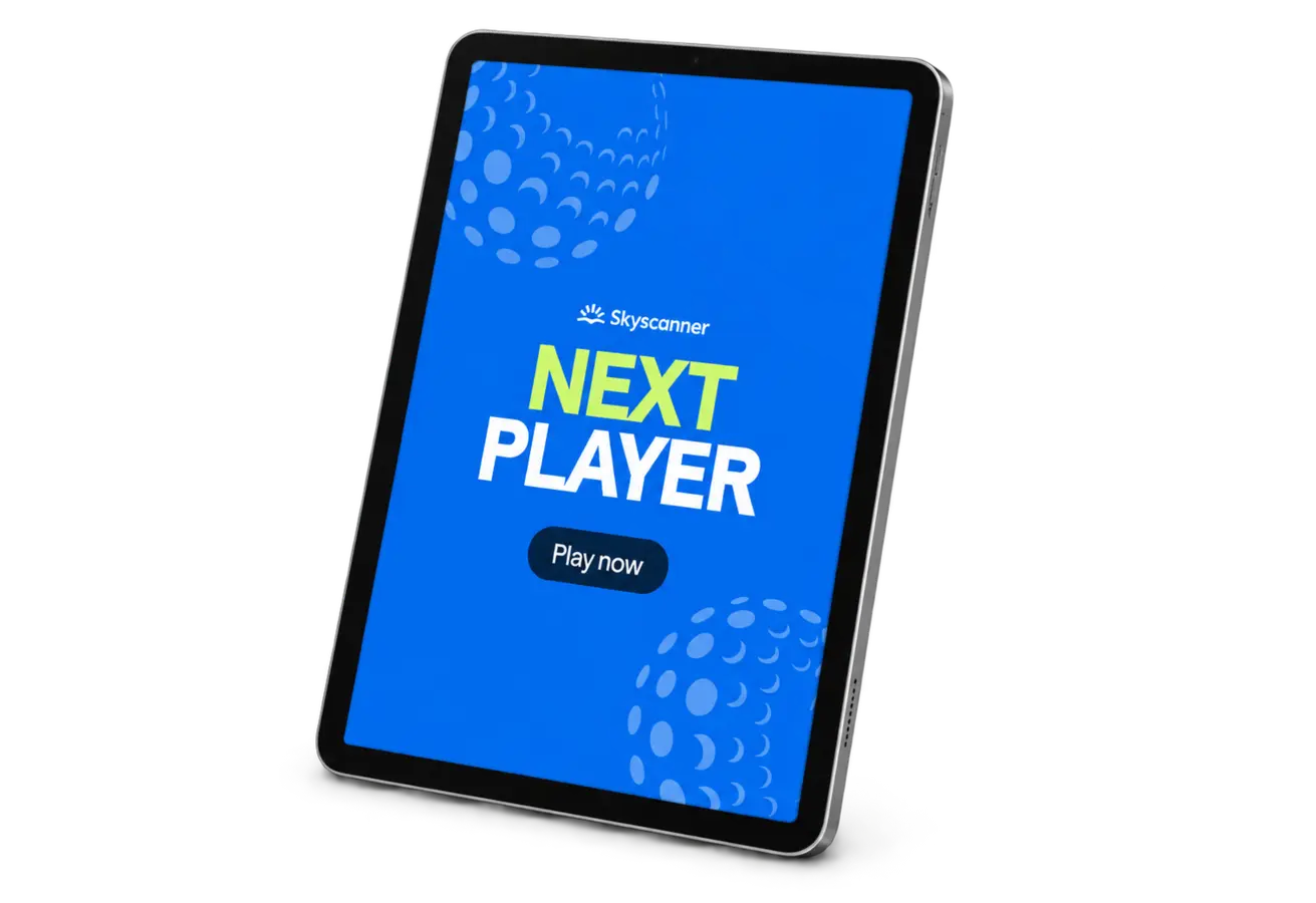 Stand-free iPad mockup displaying the Skyscanner Next Player screen